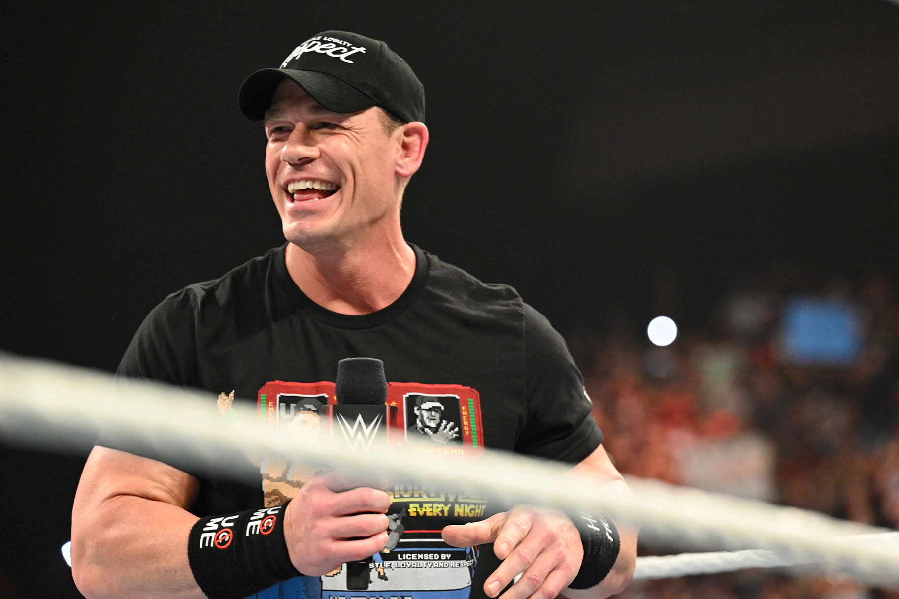 Close up of John Cena smiling in the ring