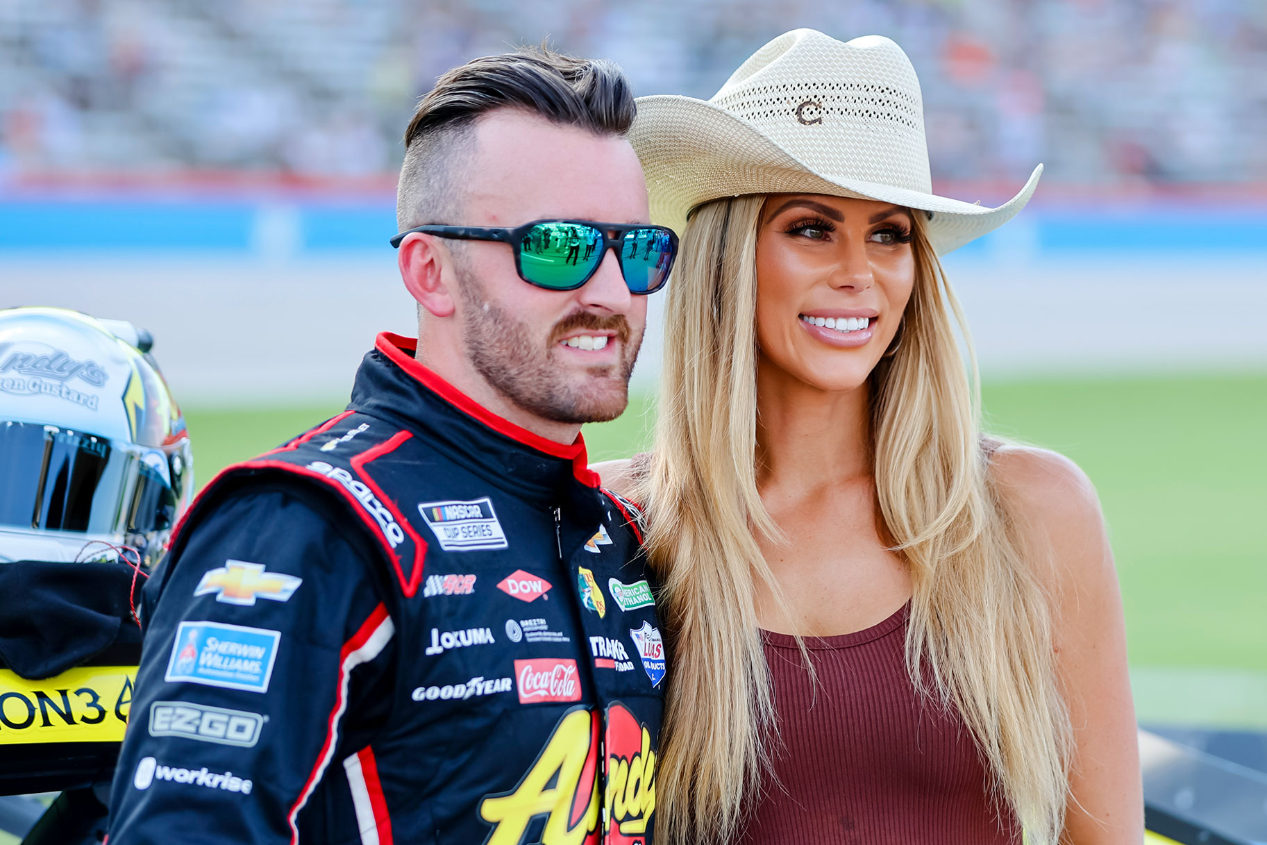 Life In The Fast Lane's Austin and Whitney Dillon posed together on the racetrack