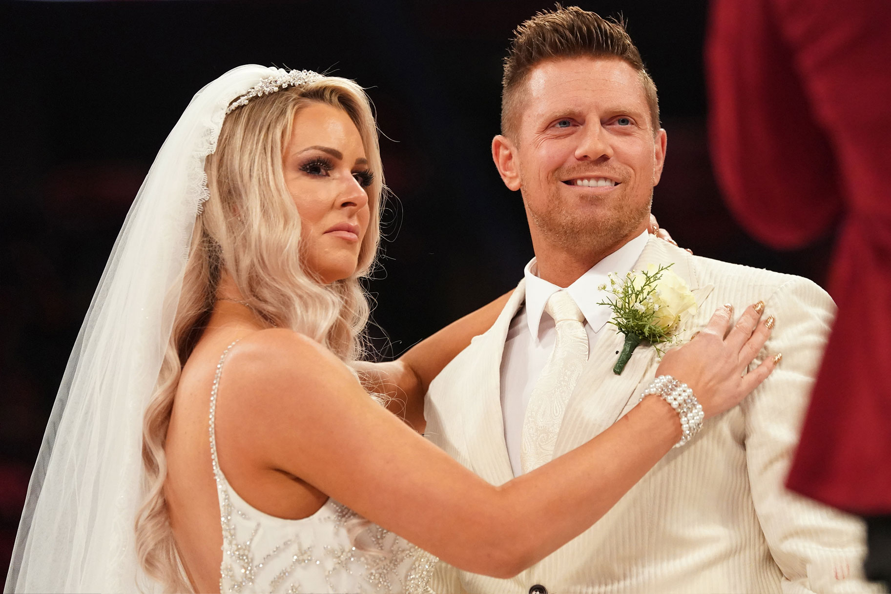 The Miz and Maryse dressed as a bride and groom