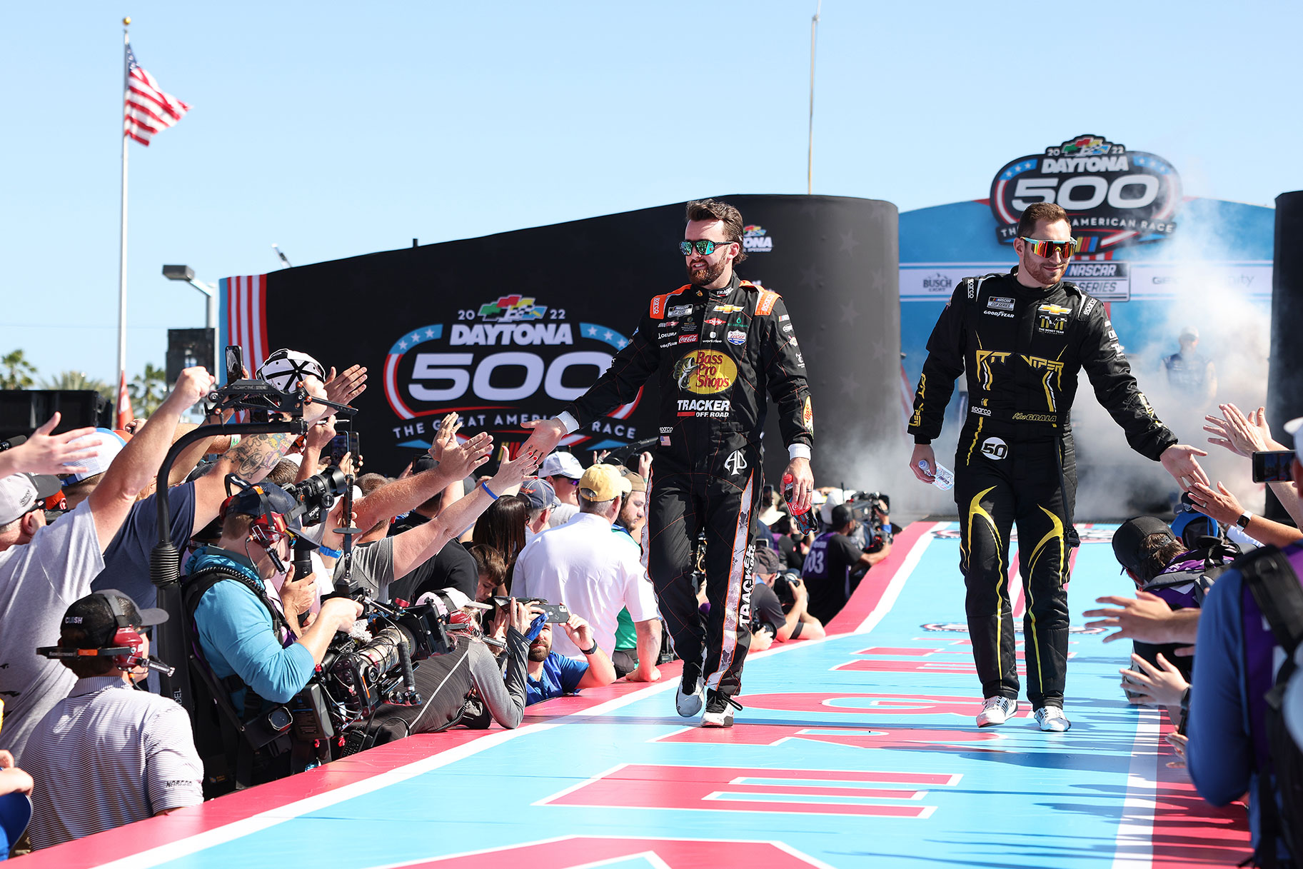 Austin and another NASCAR driver greeting fans