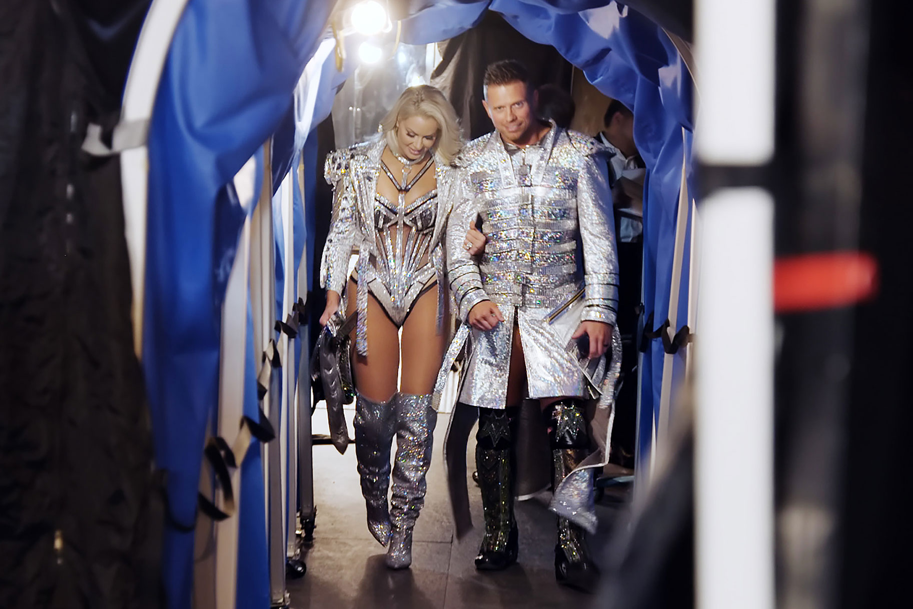 Miz And Maryse walking through a tunnel