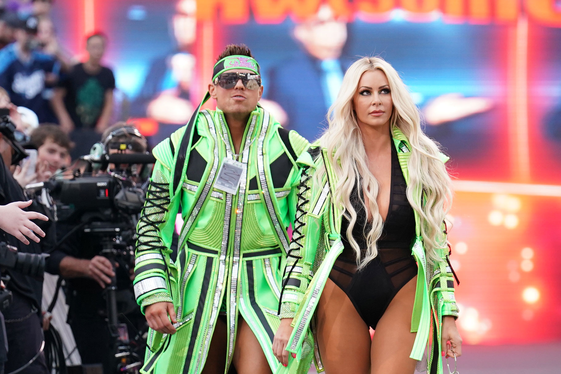 Miz and Maryse walking to the stage