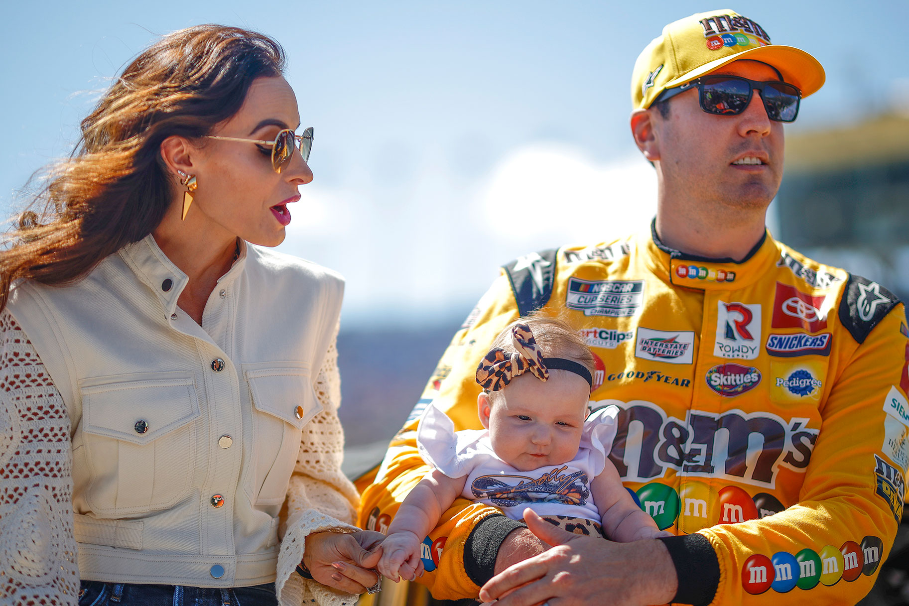Kyle Busch holding his daughter
