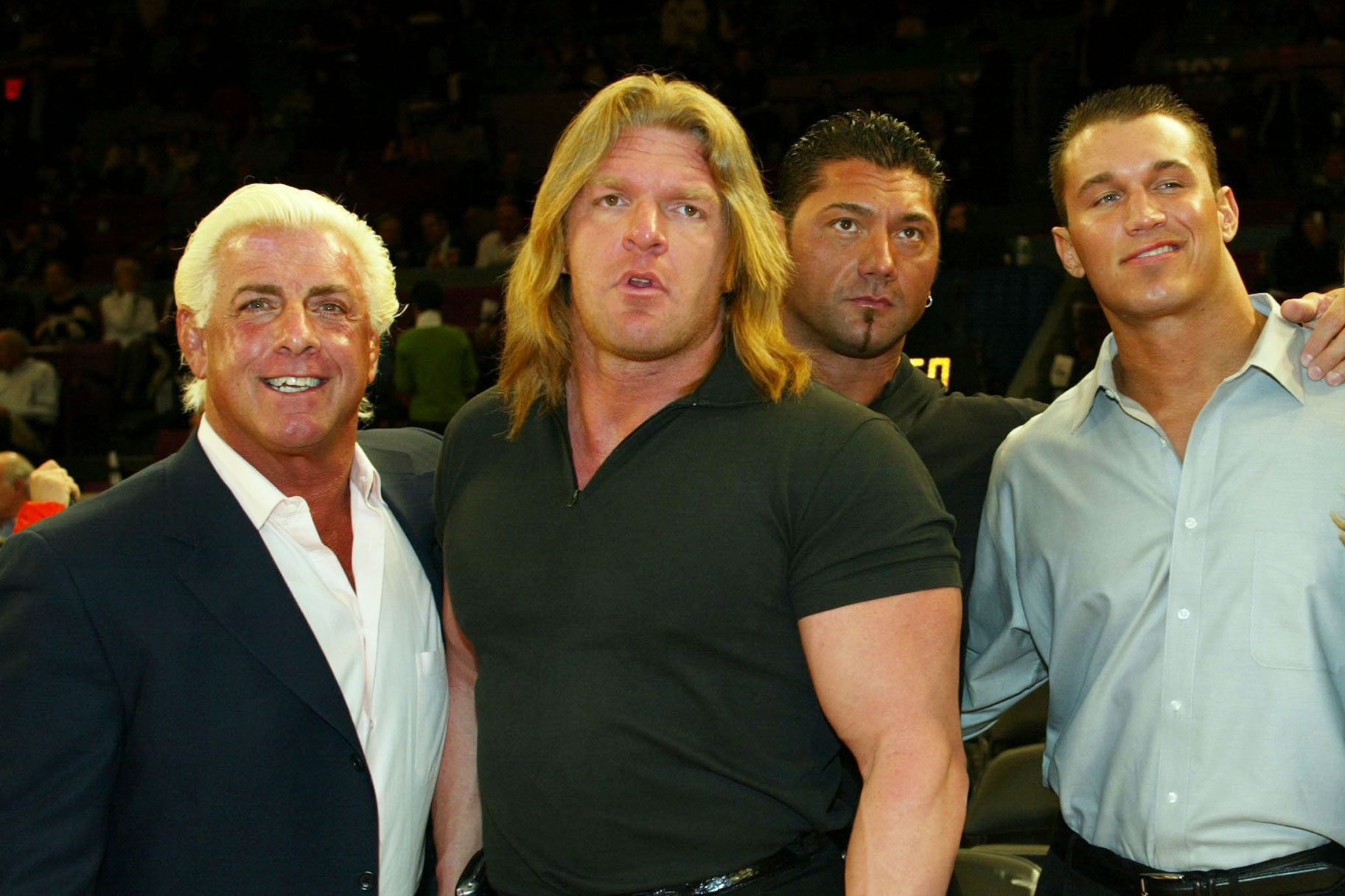 Rick Flair, Triple H, Bautista, and Randy Orton as Evolution