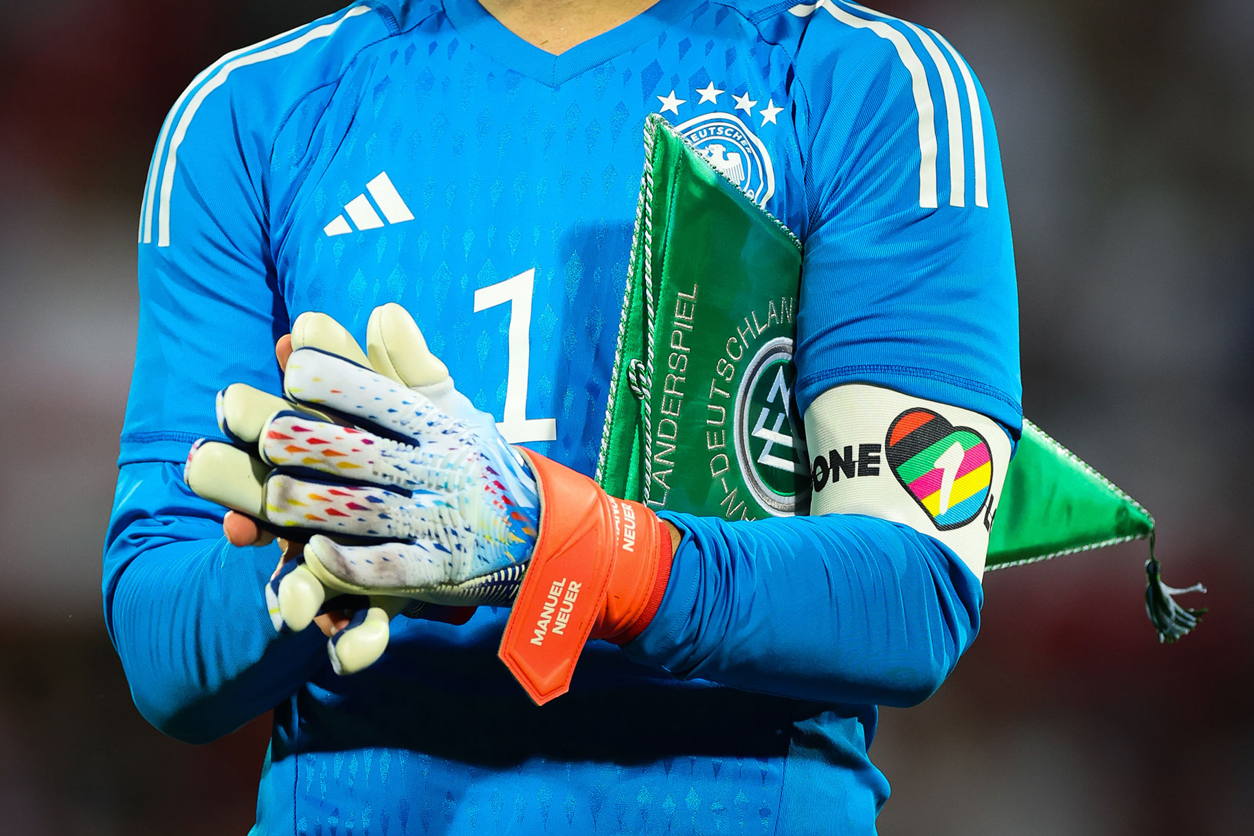 Germany's goalkeeper and captain Manuel Neuer wears the captain's armband with the inscription "One Love"