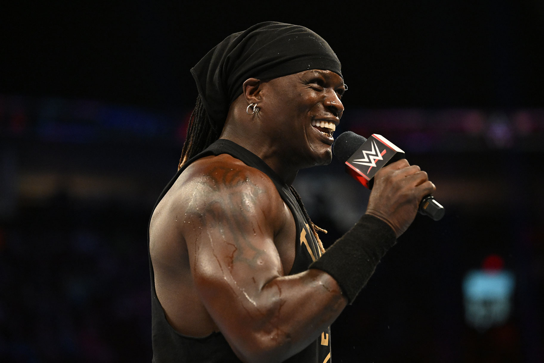 R Truth speaking to the crowd