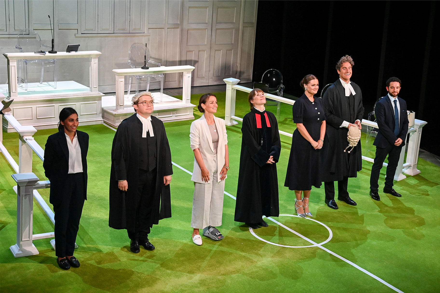 Sharan Phull, Jonathan Broadbent, Laura Dos Santos, Charlotte Randle, Lucy May Barker, Tom Turner and Nathan McMullen onstage during the curtain call at the press night performance of "Vardy V Rooney: The Wagatha Christie Trial"
