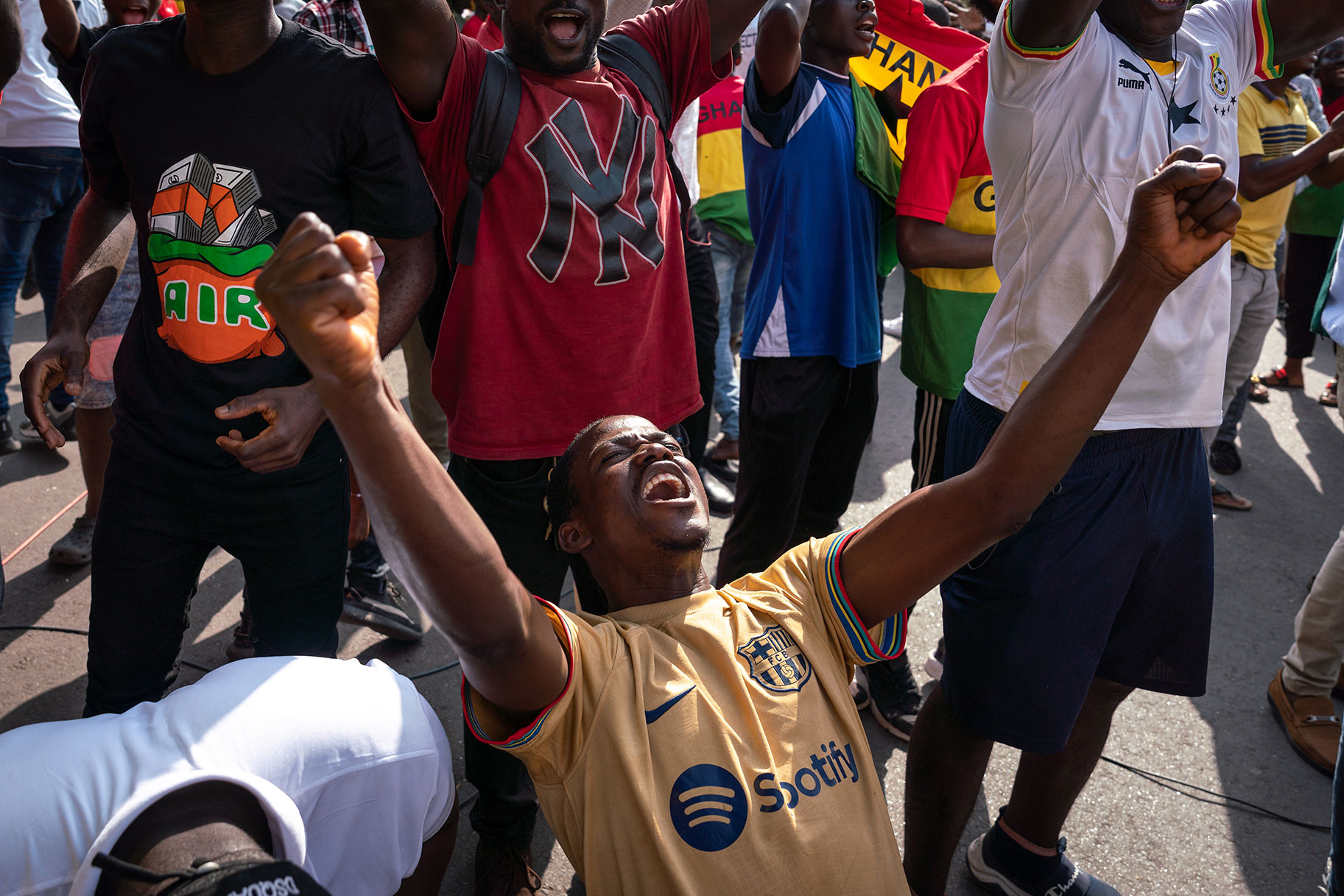 Fans celebrate at a watch party at the Ghana Broadcasting Corporation (GBC) in Accra as Ghana scores against South Korea during the FIFA World Cup Qatar 2022