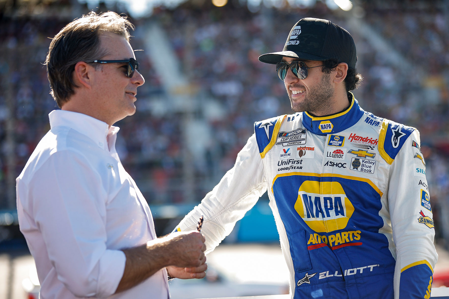Chase Elliott, driver of the #9 NAPA Auto Parts Chevrolet, and Jeff Gordon, Vice Chairman of Hendrick Motorsports talk on the grid prior to the NASCAR Cup Series Championship at Phoenix Raceway