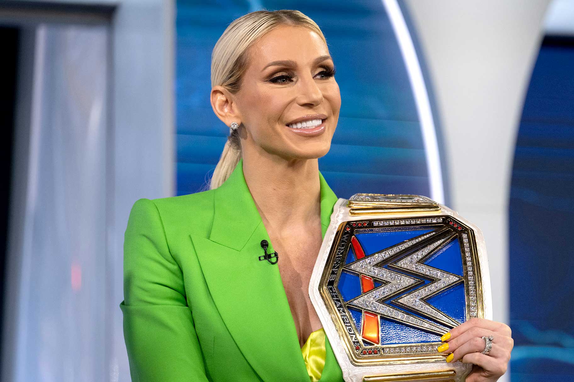 Charlotte Flair Holding WWE Belt
