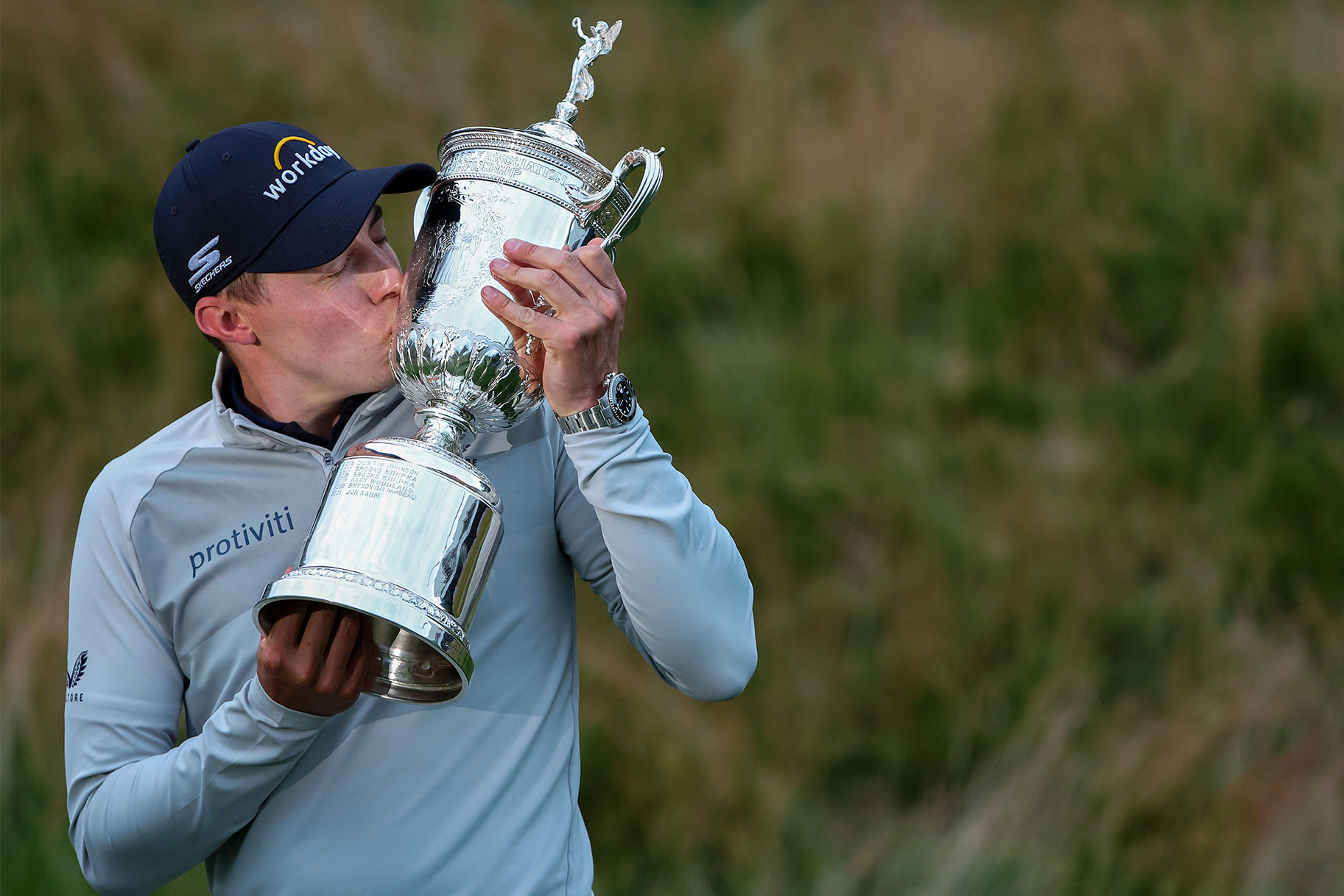 Matt Fitzpatrick of England kisses the U.S. Open Championship trophy after winning during the final round of the 122nd U.S. Open Championship