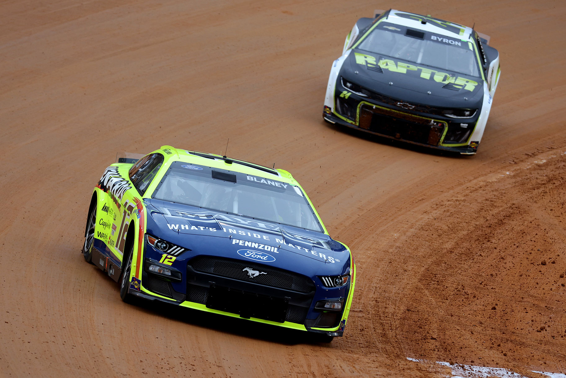 Ryan Blaney and William Byron race during a qualifier