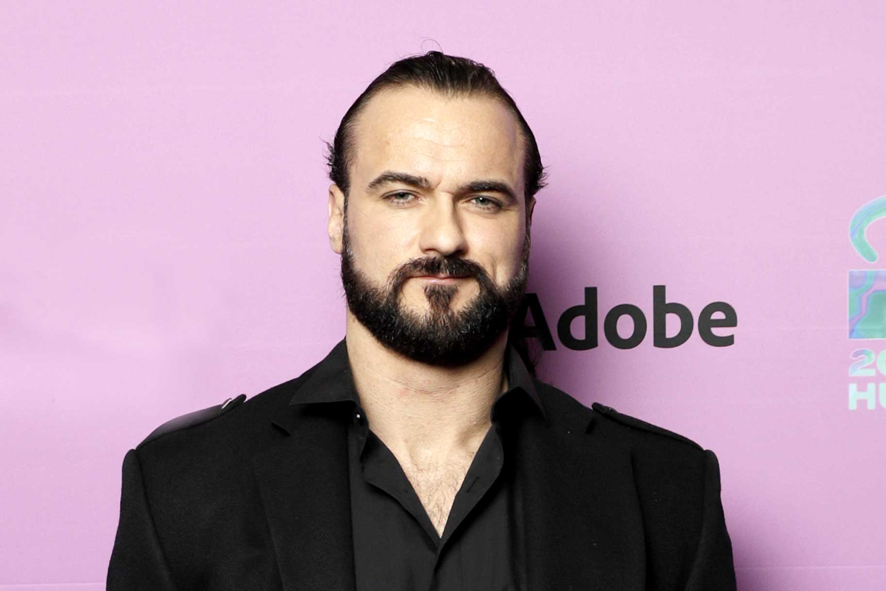 Drew Mcintyre standing on the red carpet for the MTV EMAs
