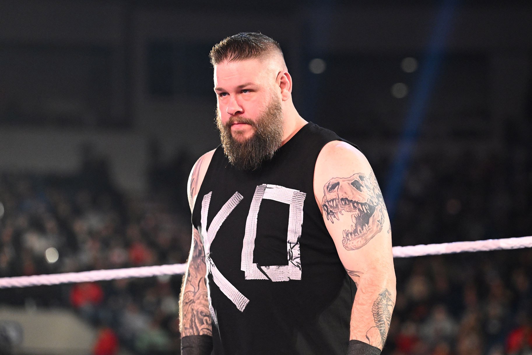 Kevin Owens standing in the ring