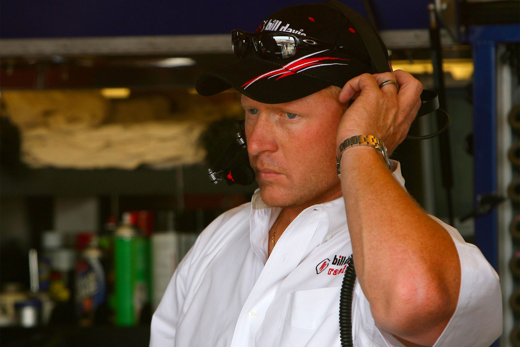Tommy Baldwin listening to his radio during a race