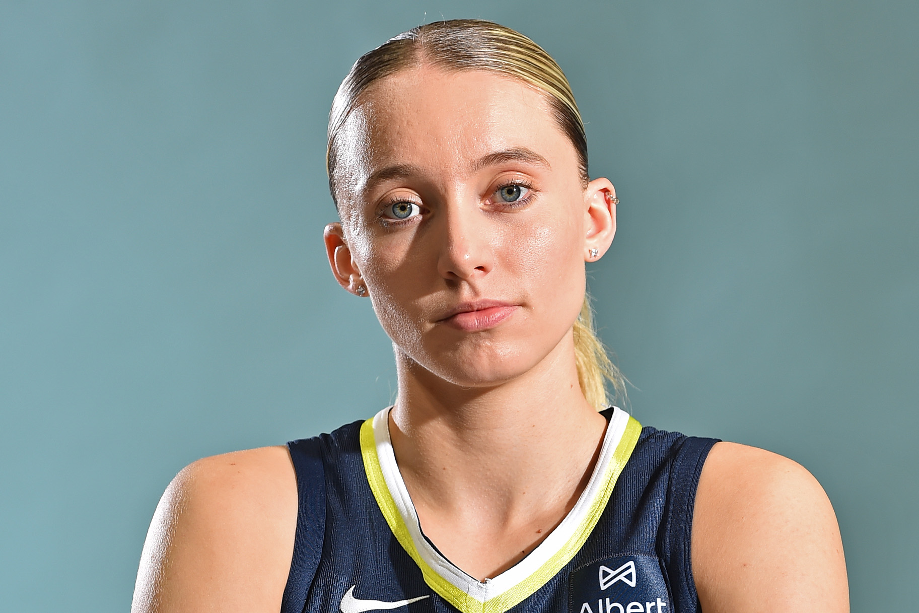 Paige Bueckers poses in WNBA jersey