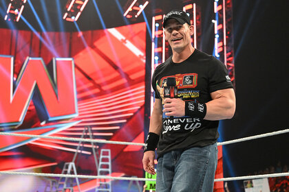 John Cena smiling in the ring
