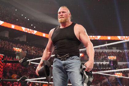 Brock Lesnar standing outside of the ring