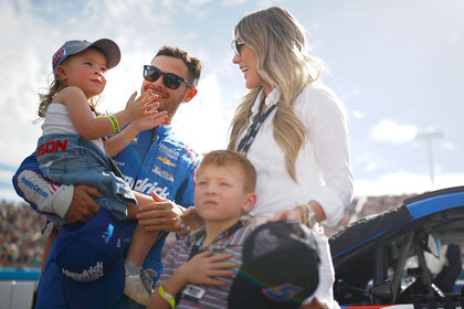 Kyle and Katelyn Larson with their children