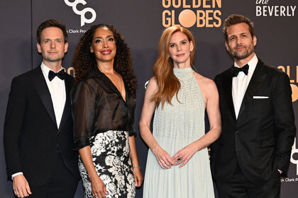 Patrick J. Adams, Gina Torres, Sarah Rafferty and Gabriel Macht pose in the press room during the 81st annual Golden Globe Awards