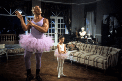 Hulk Hogan poses in a pink tutu for the movie Mr. Nanny.