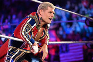 Cody Rhodes leaning against the rope