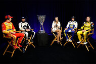 L-R) Joey Logano, driver of the #22 Shell Pennzoil Ford, Ross Chastain, driver of the #1 Moose Fraternity Chevrolet, host Alex Weaver, Chase Elliott, driver of the #9 NAPA Auto Parts Chevrolet, and Christopher Bell, driver of the #20 DeWalt Toyota, talk during a roundtable discussion at the NASCAR Championship 4 Media Day