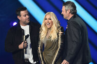 Carson Daly, Gwen Stefani and Blake Shelton stand onstage together