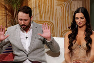 Hall Toledano holds up his hands in surrender and Kaitlin Tufts smirks during the Temptation Island Reunion.