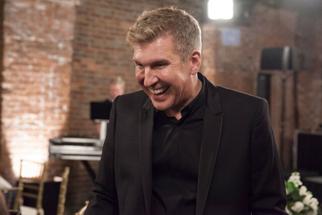 Todd Chrisley dressed in all black