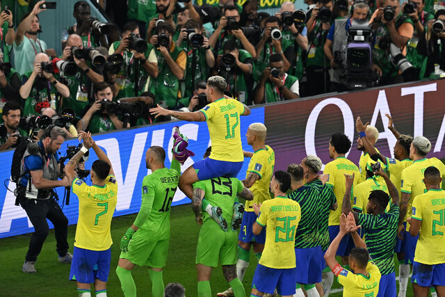 Players of Brazil celebrate at the end of the FIFA World Cup Qatar 2022 Round of 16 match between Brazil and South Korea