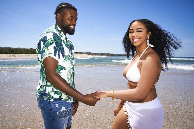 Alexis Nicole And Devon Wright hold hands on the beach on The Big D