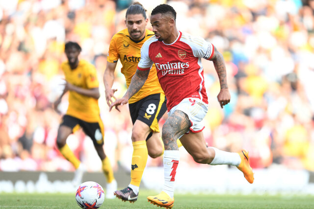 Gabriel Jesus of Arsenal races down the field against Ruben Neves of Wolves during the Premier League match between Arsenal FC and Wolverhampton Wanderers