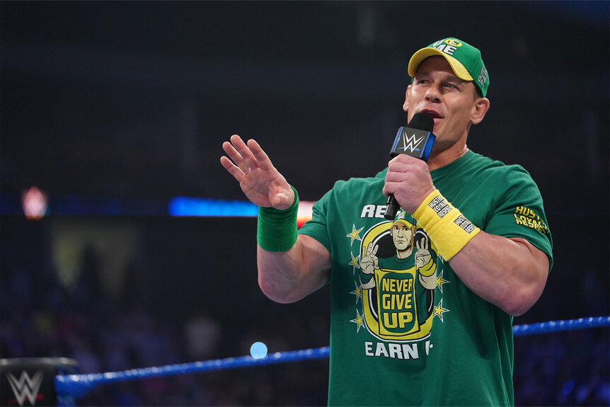 John Cena in the ring, speaking into a mic