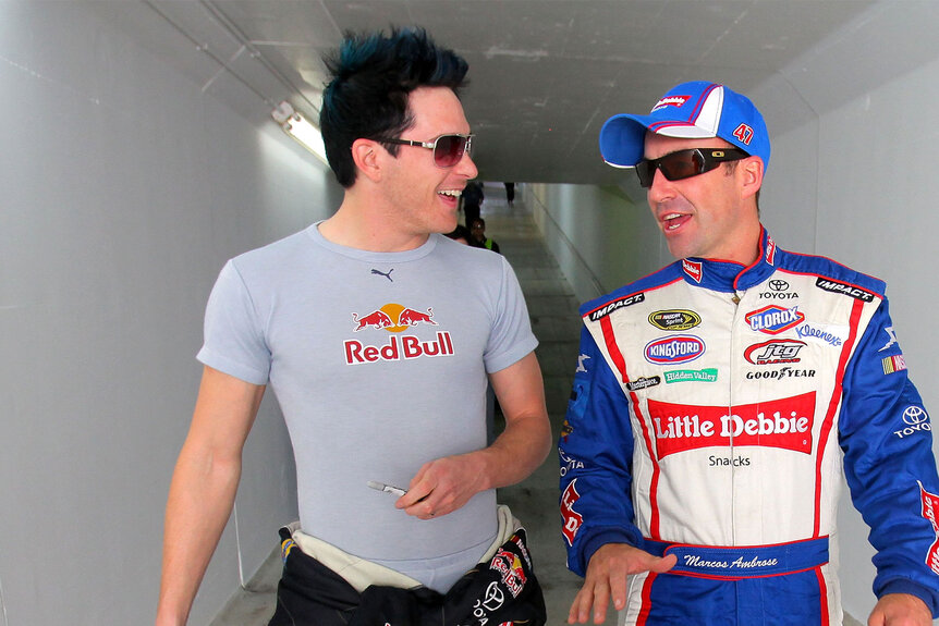 Nascar Driver Scott Speed sporting black hair with electric blue tips