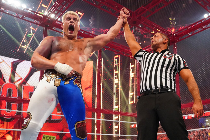 Cody Rhodes being declared the winner of his match by the referee