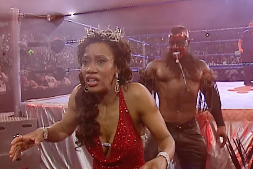 The Boogeyman standing in back of Queen Sharmell