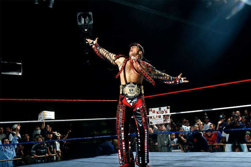 Shawn Michaels wearing a belt in the ring