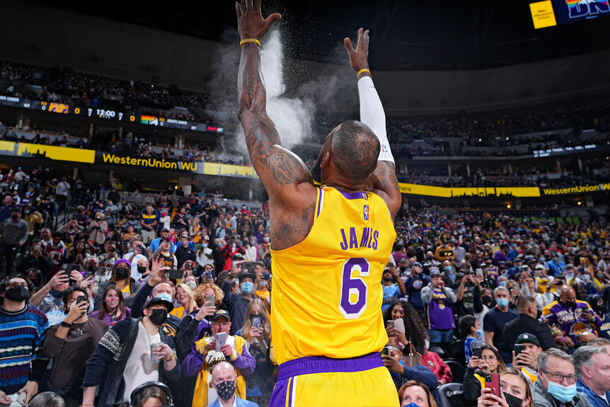 LeBron James #6 of the Los Angeles Lakers throws up chalk prior to a game against the Denver Nuggets on January 15, 2022