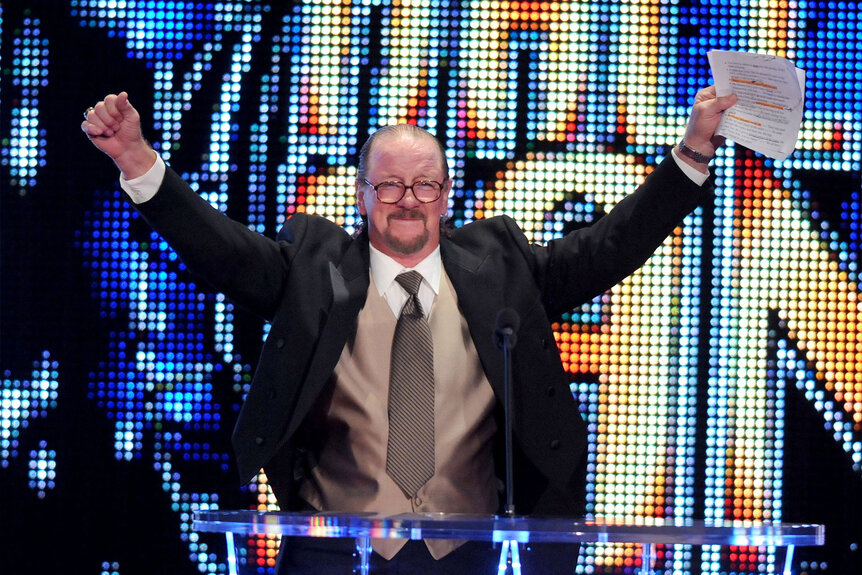 Terry Funk with his arms up during the WWE 2011 Hall of Fame ceremony