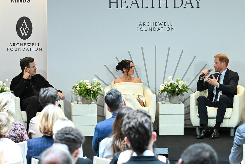 Carson Daly, Meghan, Duchess of Sussex, Prince Harry, Duke of Sussex and Dr. Vivek H. Murthy speak onstage