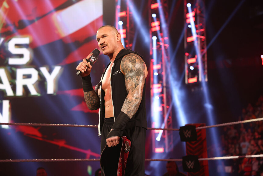 Randy Orton speaks while standing in the ring