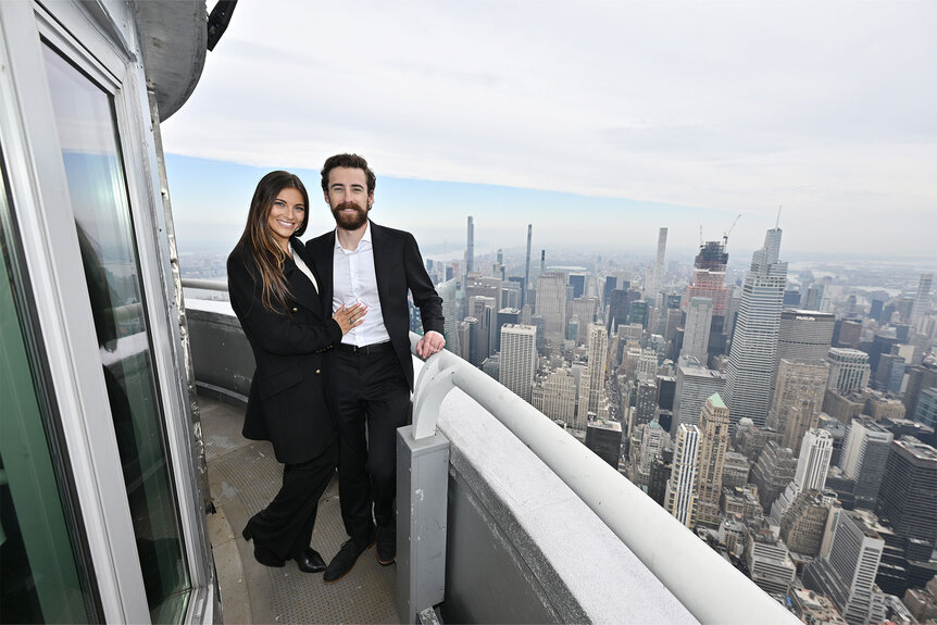 Ryan Blaney and Gianna Tulio pose for a photo at the top of the Empire State building