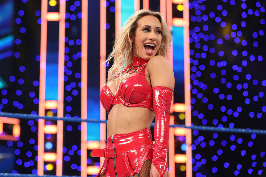 Carmella stands inside the WWE ring