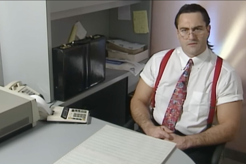 Mike Rotunda speaks to the camera in a WWF skit