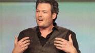 Blake Shelton with a shocked look on his face